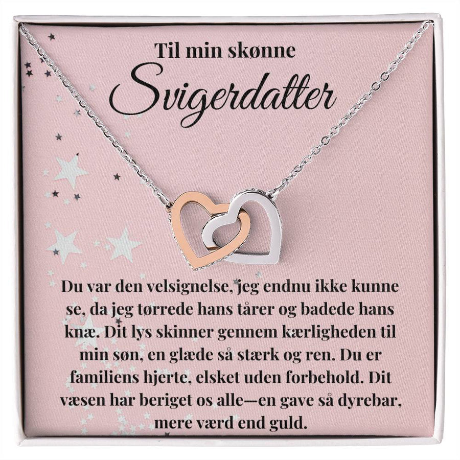 Smuk halskæde med to sammensmedede hjerter pyntet med CZ-krystaller, perfekt gave fra svigermor eller svigerfar til svigerdatter