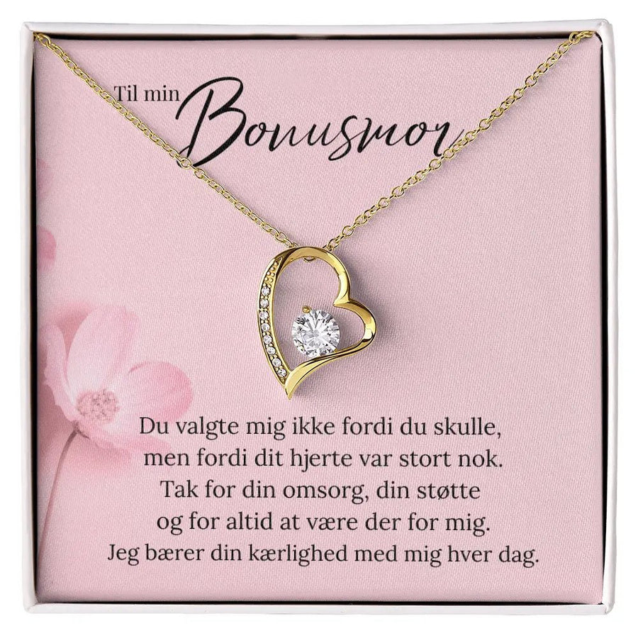 Hjerteformet halskæde i 18 karat guldbelægning med rund funklende sten og kort til bonusmor