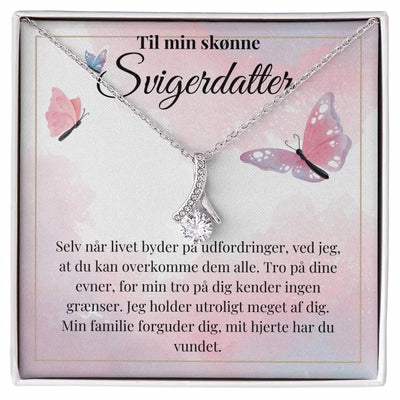 Elegant halskæde i rustfrit stål med sløjfedesign og Cubic Zirkonia-sten. Gaveæske med rørende budskab til svigerdatter. En meningsfuld gaveidé til særlige begivenheder.