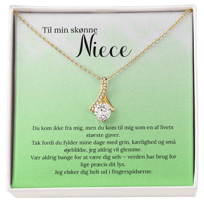Betydningsfuld gave til niece – elegant guldbelagt smykke med kærlig hilsen fra moster