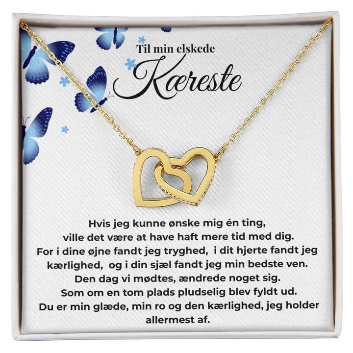 Interlocking Hearts halskæde i guld til kæreste – en kærlig gave med dyb betydning