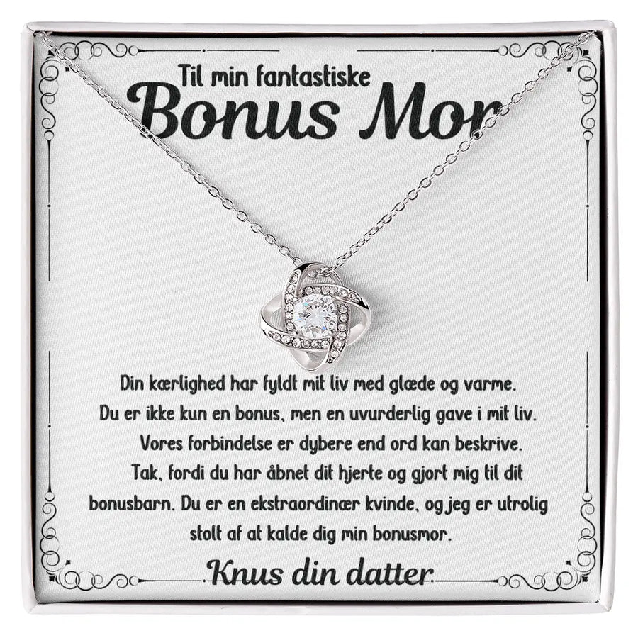 Halskæde i rustfrit stål med 14k hvidguldsbelægning og Cubic Zirkonia. Inkluderer gaveæske og kort til bonusmor – en stærk og smuk kærlighedsgave.